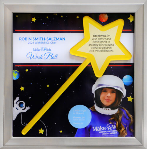 Framed 2026 Wish Ball award with a space theme, yellow star wand, and a child in a space helmet.