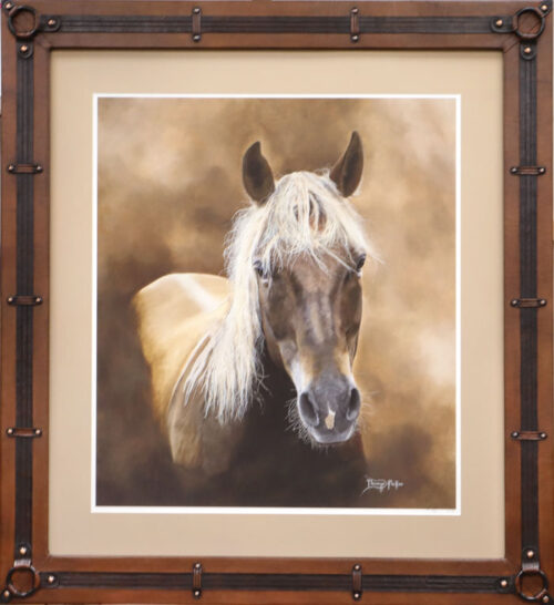 Western-style framed portrait of a palomino horse, featuring a rustic leather-look frame with metal studs.